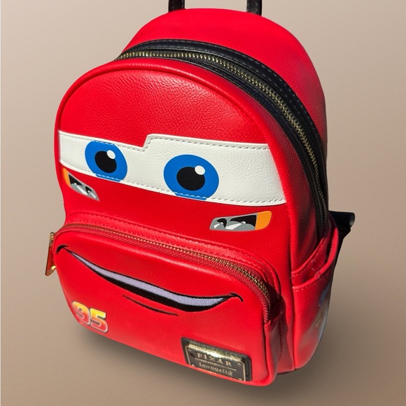 Loungefly Handbags - OG Lightning McQueen Mini Backpack